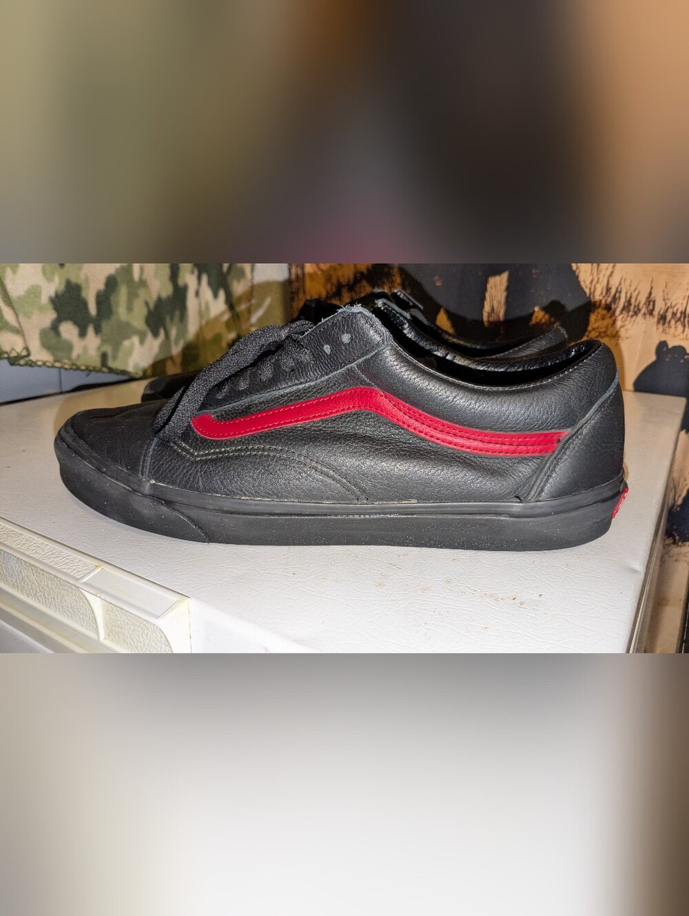 Vans Black Low-Top Sneakers with Red Side Stripe